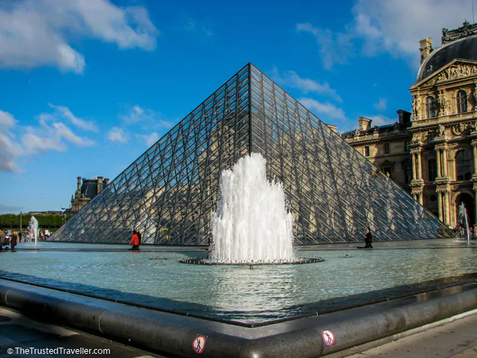 The glass pyramid at the Louvre - 30 Things to Do in Paris - The Trusted Traveller