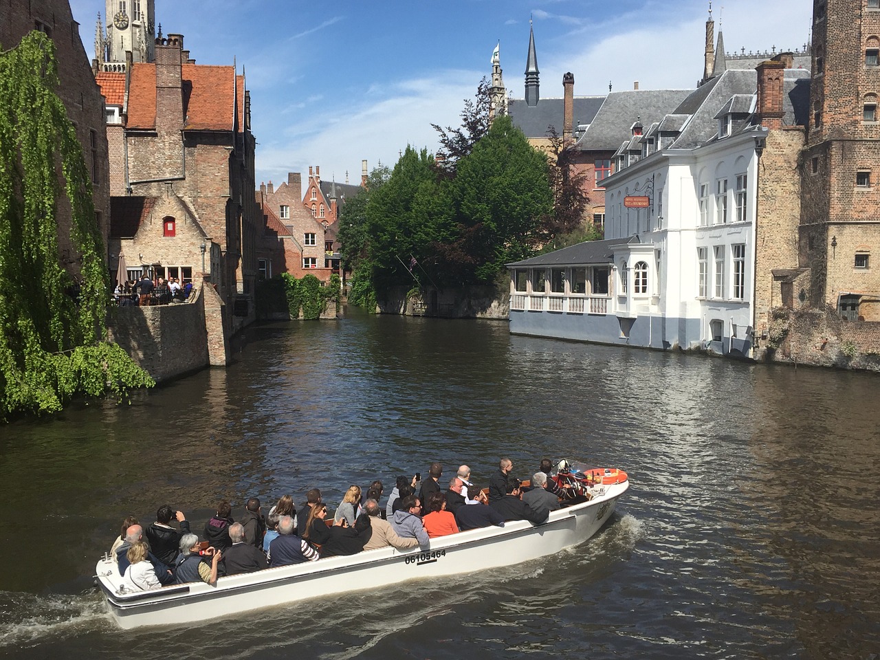 Cruising the canals in Bruges - Belgium Travel Guide - The Trusted Traveller