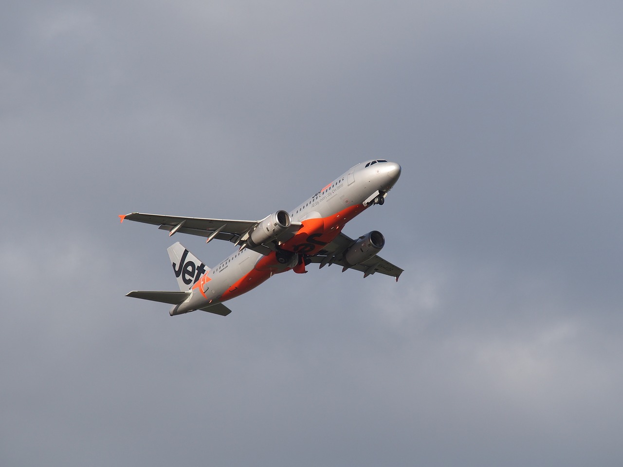 Jetstar flight taking off - The Complete Guide to Getting Around Australia - The Trusted Traveller