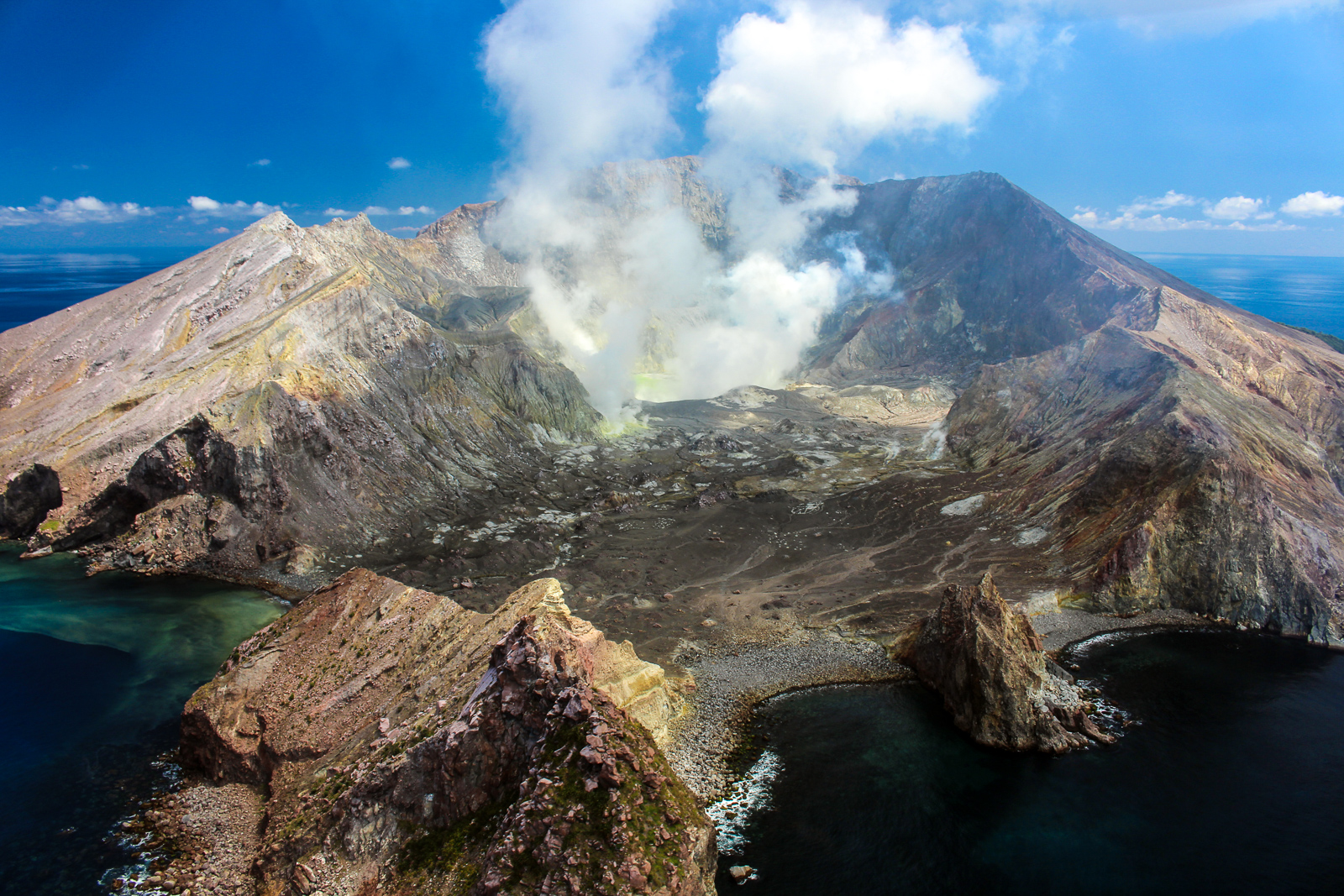 Whakaari, White Island. A volcanic island in the Bay of Plenty close to Whakatane. best places to visit in New Zealand travel blog. Flying and Travel